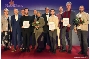 Freude bei allen Ausgezeichneten  über die Zukunftspreise 2025 - zusammen mit v.l.n.r. Anja Schurich, Geschäftsführerin bei Rehaform GmbH , Landrat Dr. Stefan Kerth, dem Rektor der Hochschule Stralsund, Prof. Dr. Ralph Sonntag, Oberbürgermeister Alexander Badrow (4.v.l.) und Klaus-Jürgen Strupp Präsident der IHK zu Rostock (6.v.l.)